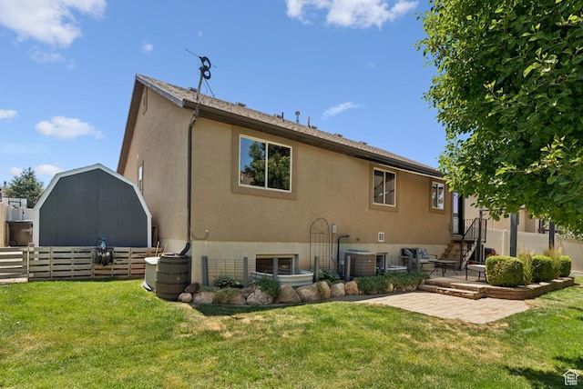 422 W 390 S, Spanish Fork, UT 84660 - back of property with a patio, stucco siding, and a storage unit