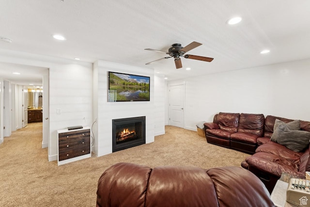 422 W 390 S, Spanish Fork, UT 84660 - living room featuring light colored carpet, recessed lighting, ceiling fan, and a lit fireplace