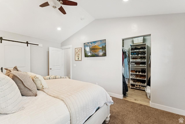 422 W 390 S, Spanish Fork, UT 84660 - bedroom with vaulted ceiling, light carpet, a barn door, a walk in closet, and recessed lighting