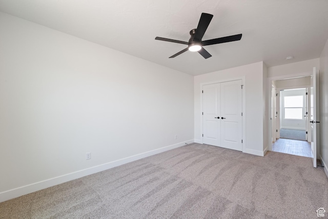 507 N 3650 W, Hurricane, UT 84737 - unfurnished bedroom with light colored carpet, a closet, and ceiling fan