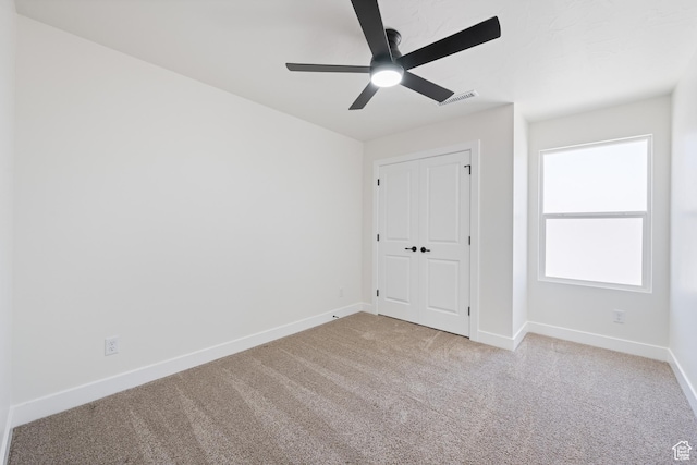 507 N 3650 W, Hurricane, UT 84737 - unfurnished bedroom featuring carpet, ceiling fan, and a closet