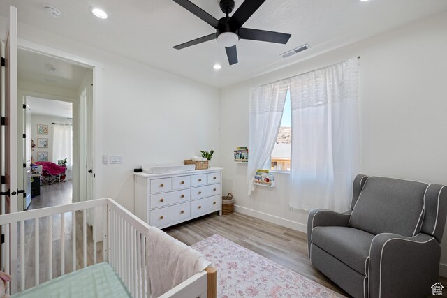 507 N 3650 W, Hurricane, UT 84737 - bedroom with a crib, wood finished floors, recessed lighting, and ceiling fan