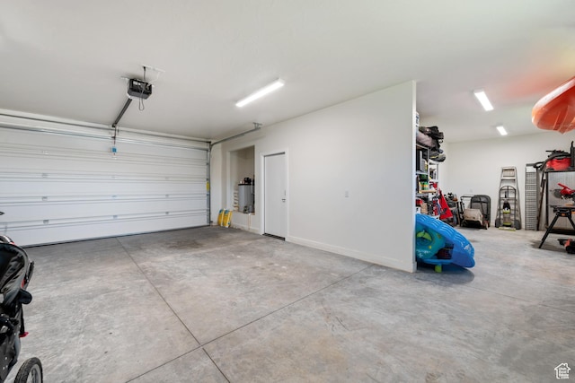 507 N 3650 W, Hurricane, UT 84737 - garage featuring a garage door opener and water heater