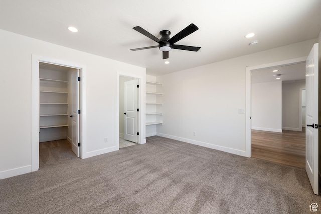 507 N 3650 W, Hurricane, UT 84737 - unfurnished bedroom with a walk in closet, carpet floors, recessed lighting, and a ceiling fan
