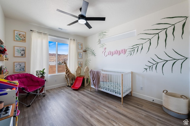 507 N 3650 W, Hurricane, UT 84737 - bedroom featuring wood finished floors and a ceiling fan