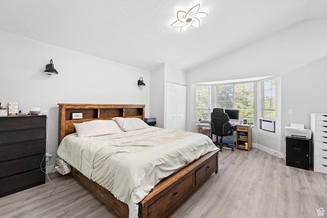 9375 S Laurel Ridge Cir, West Jordan, UT 84088 - bedroom featuring vaulted ceiling, light wood-style flooring, an office area, and a closet