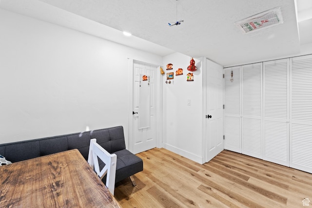 9375 S Laurel Ridge Cir, West Jordan, UT 84088 - home office with light wood-style floors and baseboards