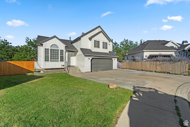 9375 S Laurel Ridge Cir, West Jordan, UT 84088 - view of front facade with driveway, a garage, brick siding, and roof with shingles