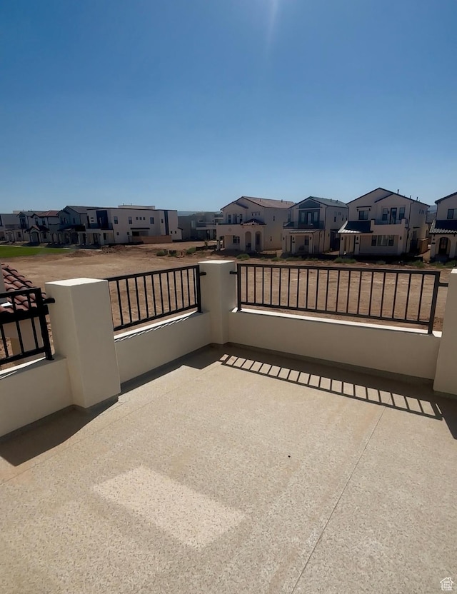 6126 S Kelly Ln, St George, UT 84790 - view of patio featuring a residential view