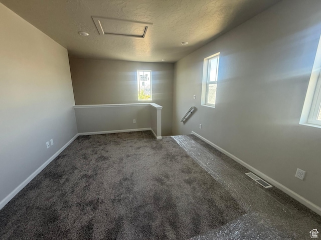 6184 W 11800 S Unit 508, Riverton, UT 84096 - carpeted spare room with attic access and a textured ceiling
