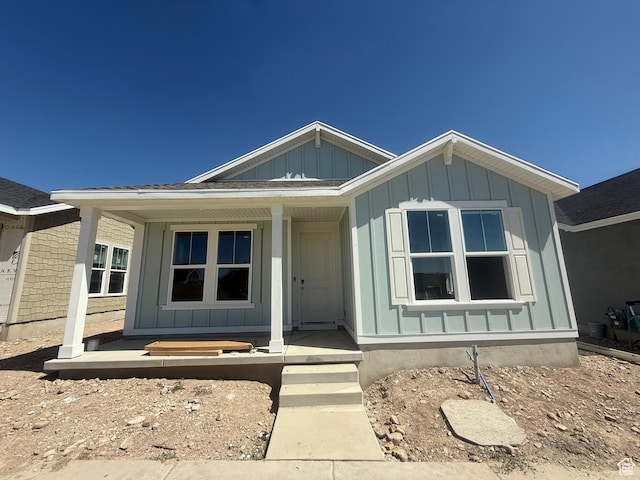 6184 W 11800 S Unit 508, Riverton, UT 84096 - view of front of property featuring board and batten siding and covered porch