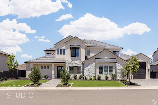 671 E Arina Way, Washington, UT 84780 - view of front of house featuring stone siding, a tile roof, and driveway