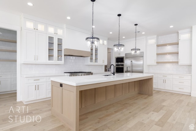 671 E Arina Way, Washington, UT 84780 - kitchen with built in appliances, open shelves, decorative backsplash, light countertops, and a large island