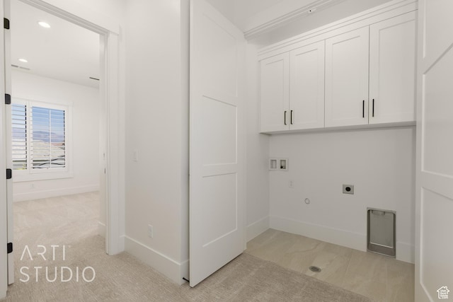 671 E Arina Way, Washington, UT 84780 - laundry area featuring cabinet space, electric dryer hookup, hookup for a washing machine, gas dryer hookup, and light colored carpet