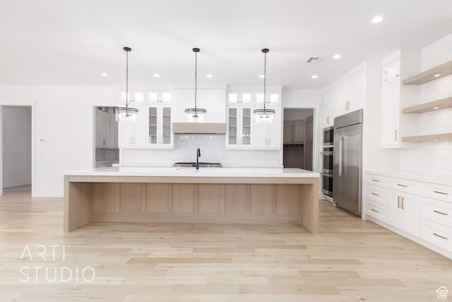 671 E Arina Way, Washington, UT 84780 - kitchen with built in appliances, open shelves, light countertops, decorative backsplash, and light wood-style floors