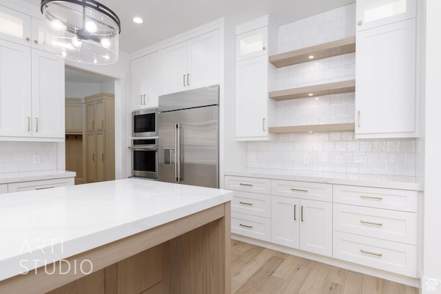 671 E Arina Way, Washington, UT 84780 - kitchen with built in appliances, open shelves, white cabinetry, decorative backsplash, and recessed lighting