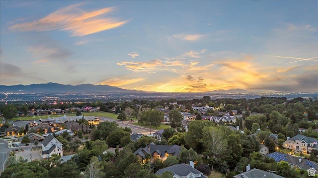 3149 E 9800 S, Sandy, UT 84092 - aerial overview of property's location featuring a mountainous background and nearby suburban area