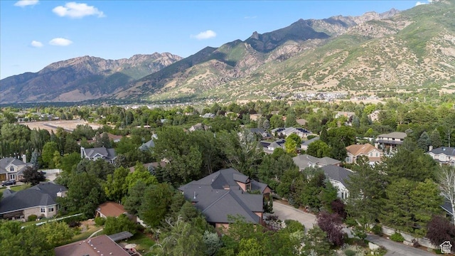 3149 E 9800 S, Sandy, UT 84092 - aerial view of property and surrounding area with mountains and nearby suburban area