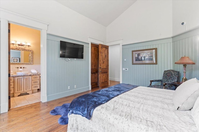3149 E 9800 S, Sandy, UT 84092 - bedroom with wood finished floors, ensuite bath, and high vaulted ceiling