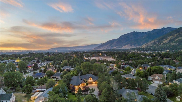 3149 E 9800 S, Sandy, UT 84092 - aerial view of property and surrounding area featuring a mountainous background and nearby suburban area