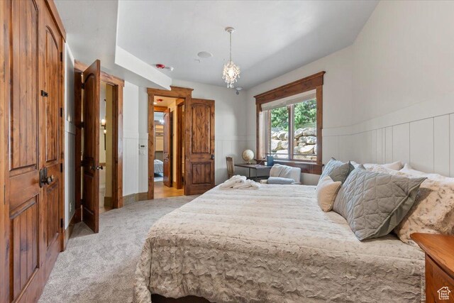 3149 E 9800 S, Sandy, UT 84092 - bedroom with light carpet, a wainscoted wall, and a decorative wall