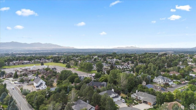 3149 E 9800 S, Sandy, UT 84092 - aerial overview of property's location with a mountainous background and nearby suburban area