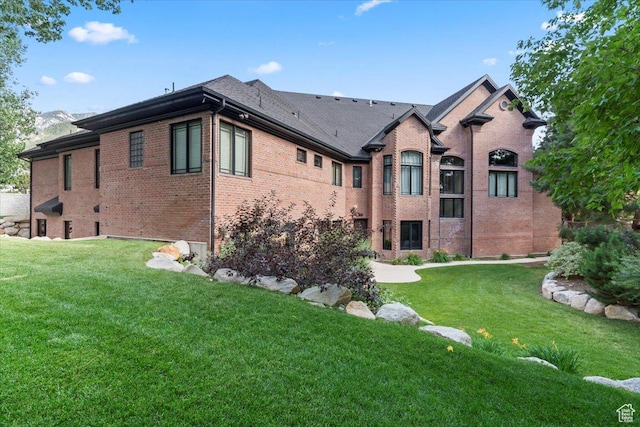 3149 E 9800 S, Sandy, UT 84092 - view of side of property with brick siding and a yard