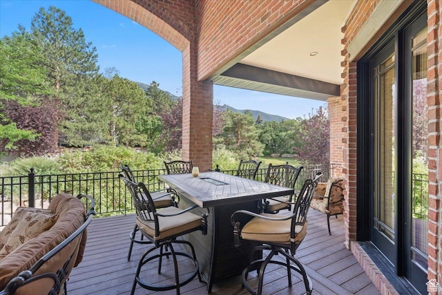 3149 E 9800 S, Sandy, UT 84092 - wooden deck with outdoor dining area and view of scattered trees