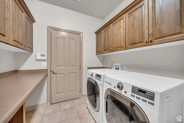 1319 W Red Butte Dr W, Washington, UT 84780 - washroom featuring cabinet space, washer and dryer, and light tile patterned floors