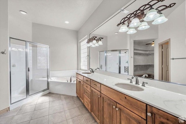 1319 W Red Butte Dr W, Washington, UT 84780 - bathroom featuring a garden tub, a shower stall, double vanity, tile patterned floors, and a spacious closet