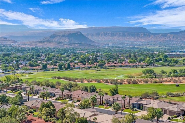 1319 W Red Butte Dr W, Washington, UT 84780 - aerial perspective of suburban area with a mountainous background and a golf club
