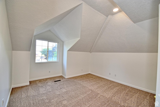 1323 S 1260 W, Orem, UT 84058 - additional living space featuring a textured ceiling, lofted ceiling, and carpet flooring