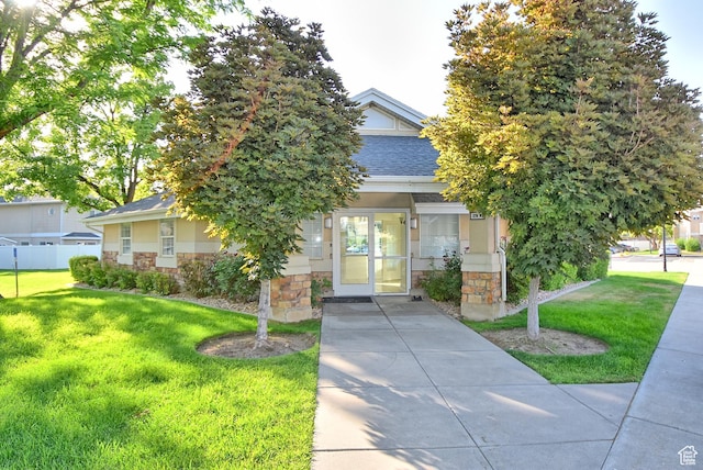 1323 S 1260 W, Orem, UT 84058 - obstructed view of property featuring stone siding and a shingled roof