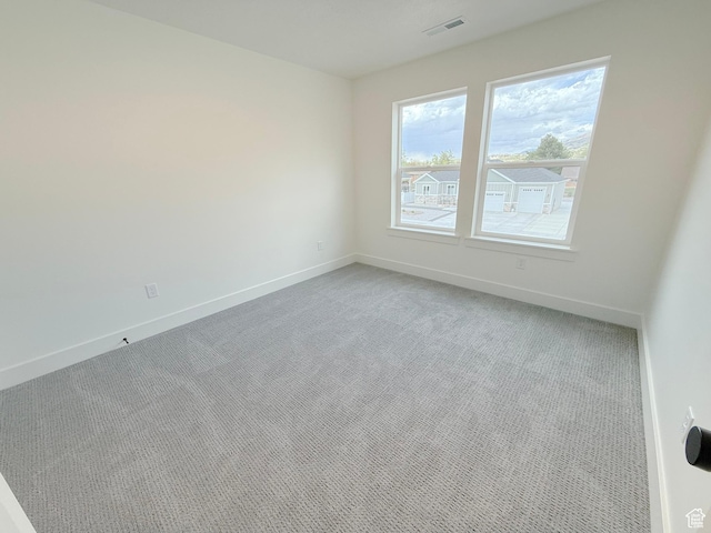 2237 E Parkside Cir S, South Ogden, UT 84403 - spare room featuring light colored carpet