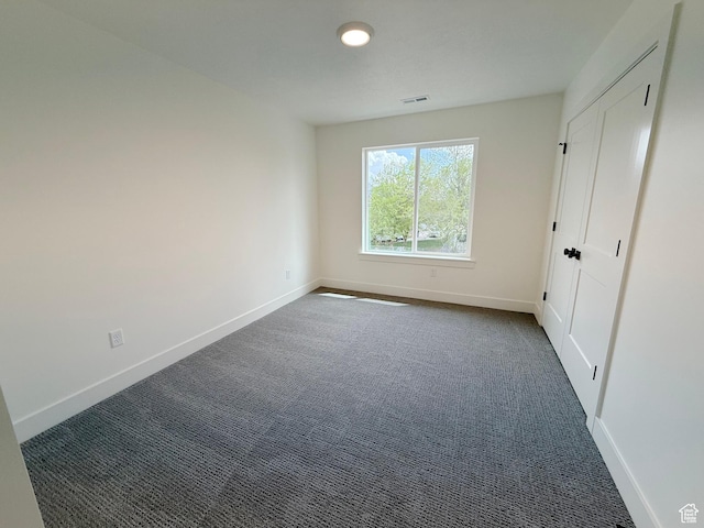 2237 E Parkside Cir S, South Ogden, UT 84403 - unfurnished bedroom with dark carpet and baseboards