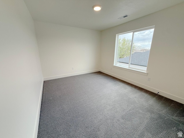 2237 E Parkside Cir S, South Ogden, UT 84403 - spare room with baseboards and dark colored carpet