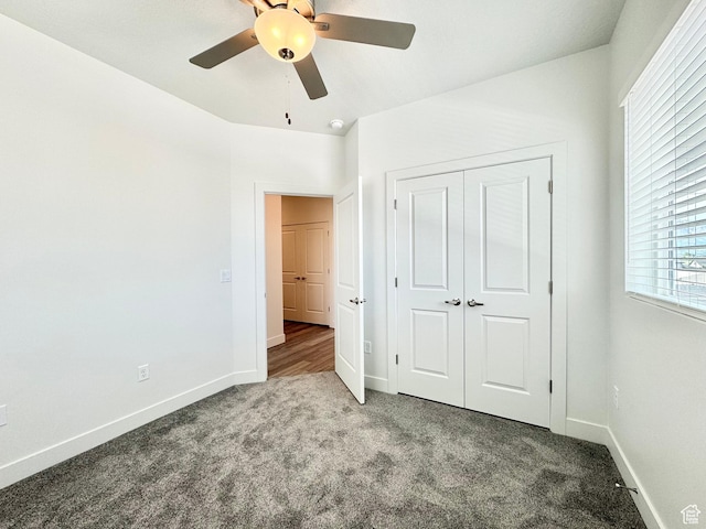 2345 W Miles Unit D15, West Haven, UT 84401 - unfurnished bedroom featuring carpet, a closet, and a ceiling fan