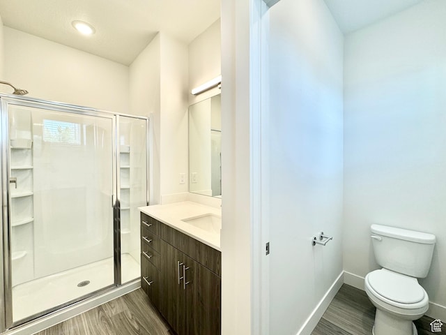 2345 W Miles Unit D15, West Haven, UT 84401 - full bathroom with a shower stall, wood finished floors, and vanity