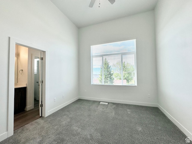 2345 W Miles Unit D15, West Haven, UT 84401 - unfurnished bedroom with carpet, connected bathroom, and ceiling fan
