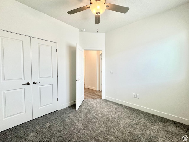 2345 W Miles Unit D15, West Haven, UT 84401 - unfurnished bedroom with carpet flooring, a closet, and a ceiling fan