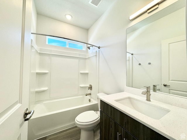 2345 W Miles Unit D15, West Haven, UT 84401 - bathroom featuring shower / bath combination, vanity, a textured ceiling, and wood finished floors