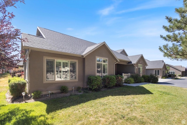 1867 W 9270 S Unit C, West Jordan, UT 84088 - ranch-style home featuring a front lawn, stucco siding, and roof with shingles