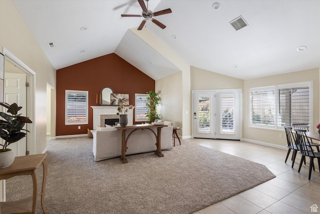 1867 W 9270 S Unit C, West Jordan, UT 84088 - living room featuring a ceiling fan, a tiled fireplace, high vaulted ceiling, and light tile patterned floors