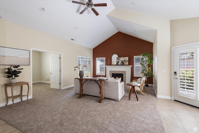 1867 W 9270 S Unit C, West Jordan, UT 84088 - living room with ceiling fan, a tile fireplace, light colored carpet, and high vaulted ceiling