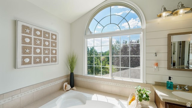 11597 N Sunset Hills Dr, Highland, UT 84003 - full bathroom featuring a garden tub, vanity, and lofted ceiling