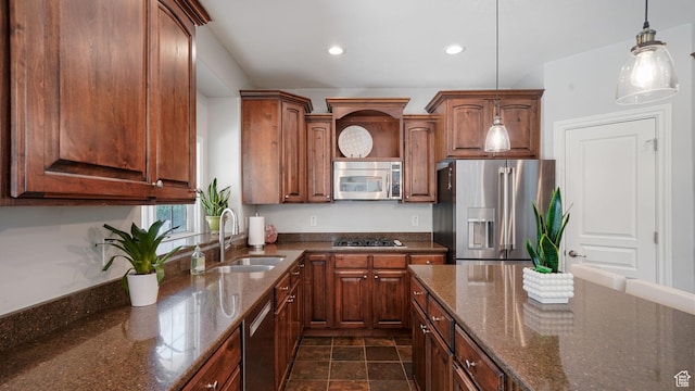 11597 N Sunset Hills Dr, Highland, UT 84003 - kitchen with appliances with stainless steel finishes, recessed lighting, pendant lighting, and dark stone countertops