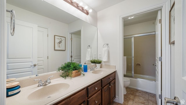 11597 N Sunset Hills Dr, Highland, UT 84003 - full bathroom with double vanity, enclosed tub / shower combo, and tile patterned flooring