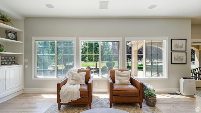 11597 N Sunset Hills Dr, Highland, UT 84003 - living area featuring light wood-style flooring and plenty of natural light