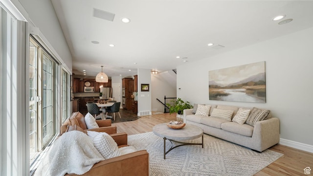 11597 N Sunset Hills Dr, Highland, UT 84003 - living area with light wood-style floors and recessed lighting