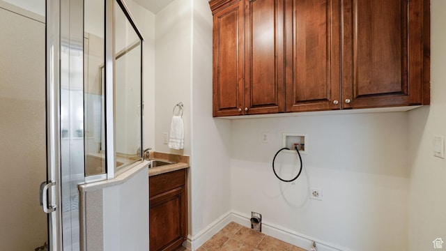 11597 N Sunset Hills Dr, Highland, UT 84003 - washroom with washer hookup, cabinet space, and electric dryer hookup